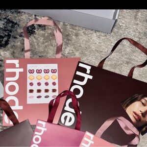 2 rhode skin large gift bags and sticker sheet